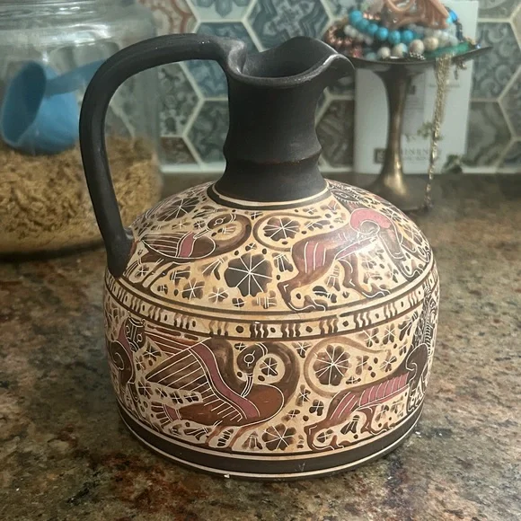 Handcrafted Ceramic Pitcher with Intricate Design - Picture 1 of 10